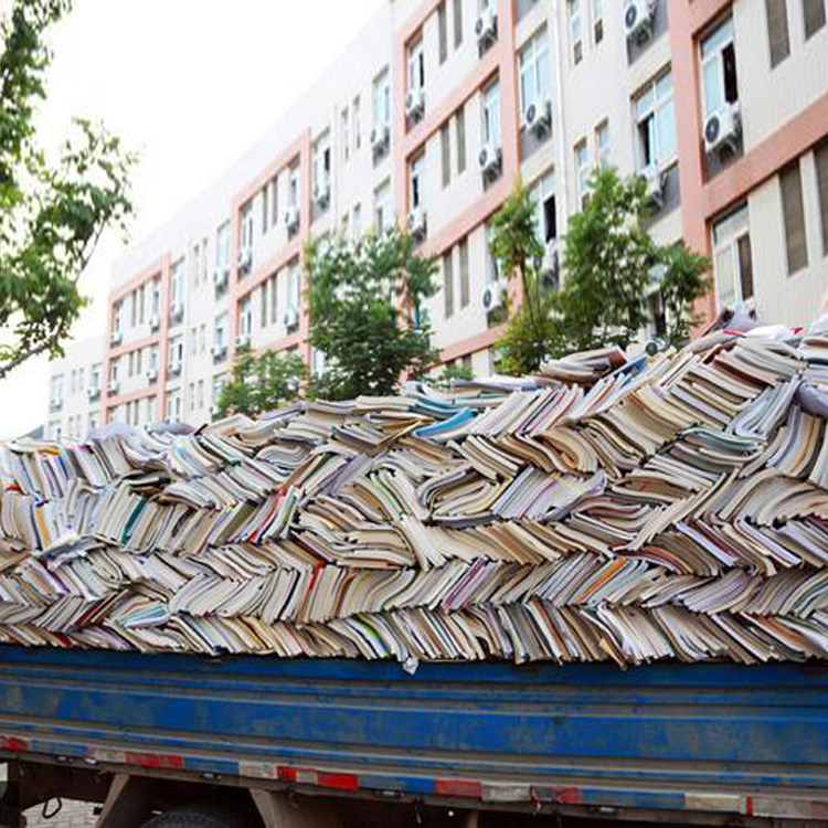 大數(shù)量的廢紙 書本切膠機來幫忙消化
